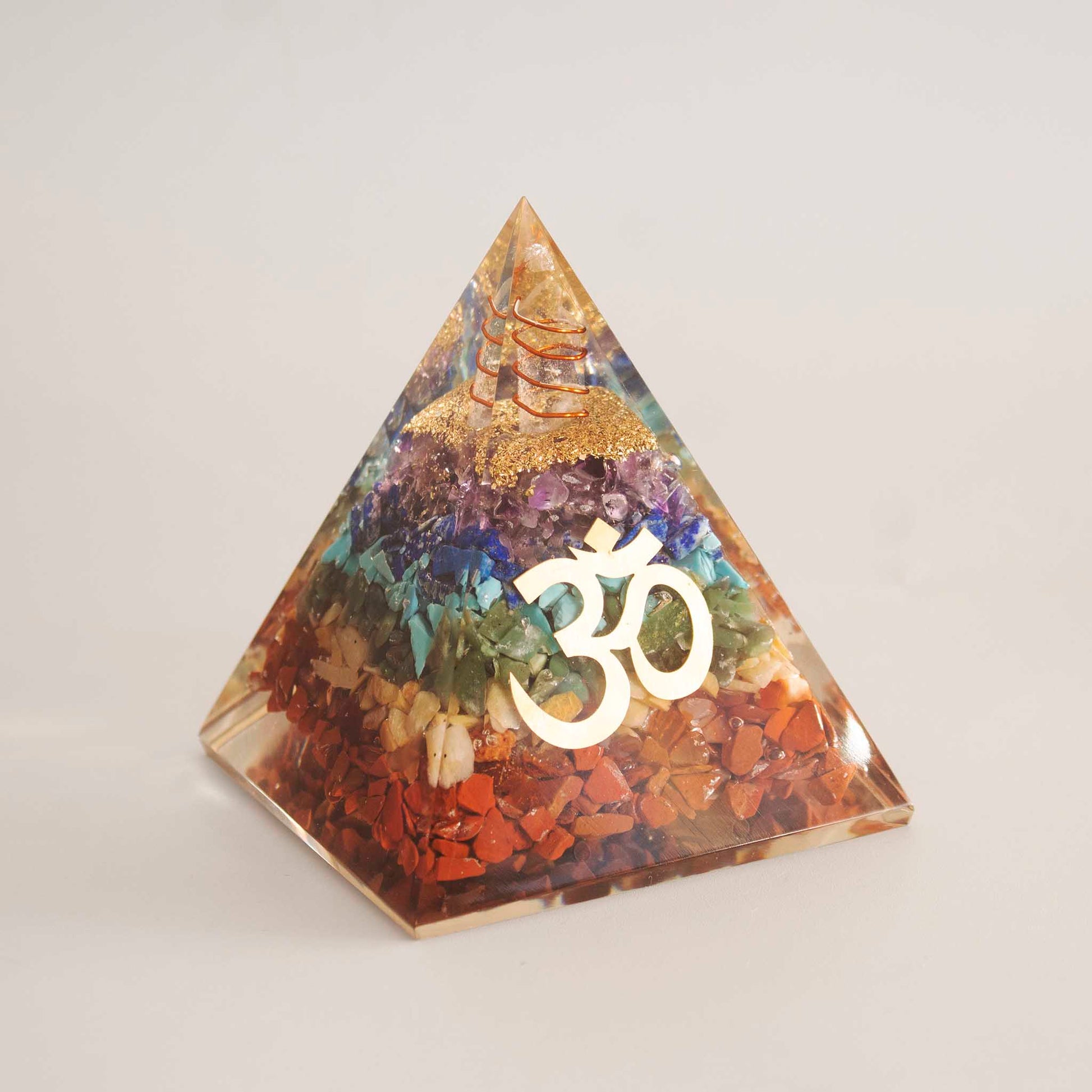 seven chakra and orgone pyramid with om