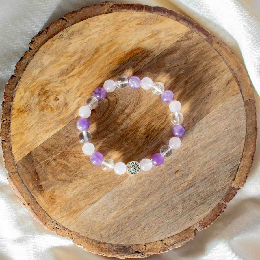 amethyst, rose quartz and clear quartz beaded bracelet with tree of life charm
