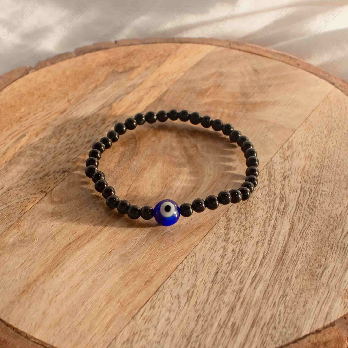 child bracelet with evil eye bead