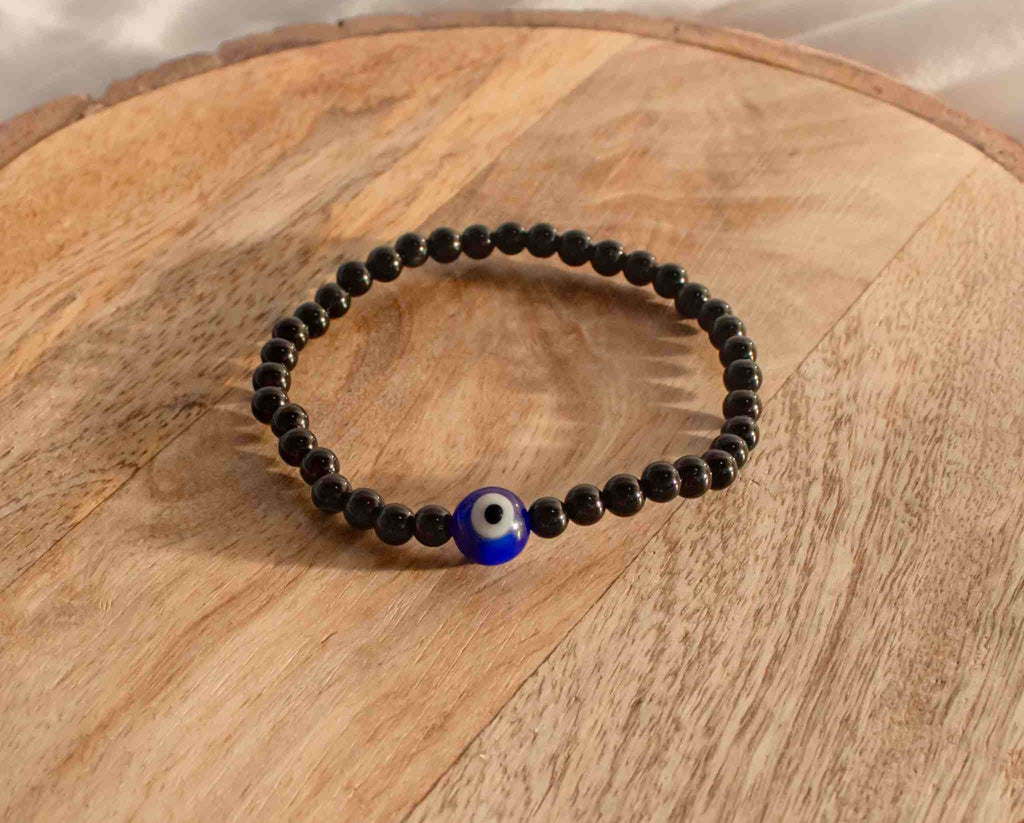 child bracelet with evil eye bead