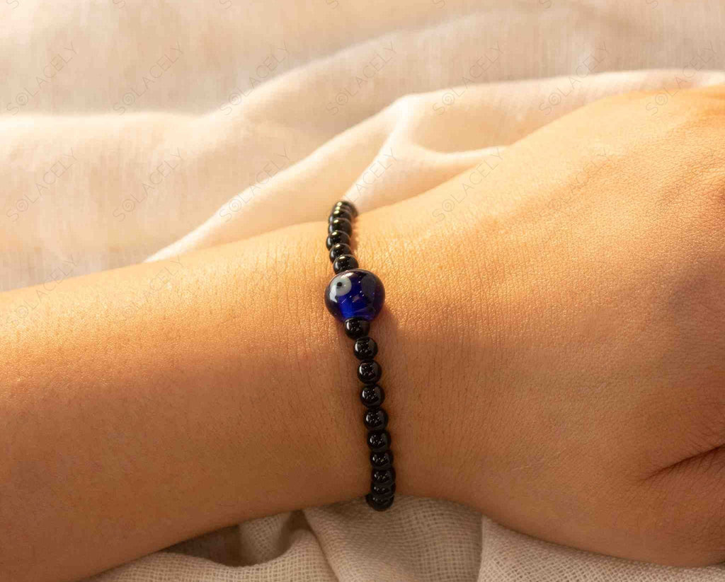 evil eye charm with 4 mm black tourmaline bracelet