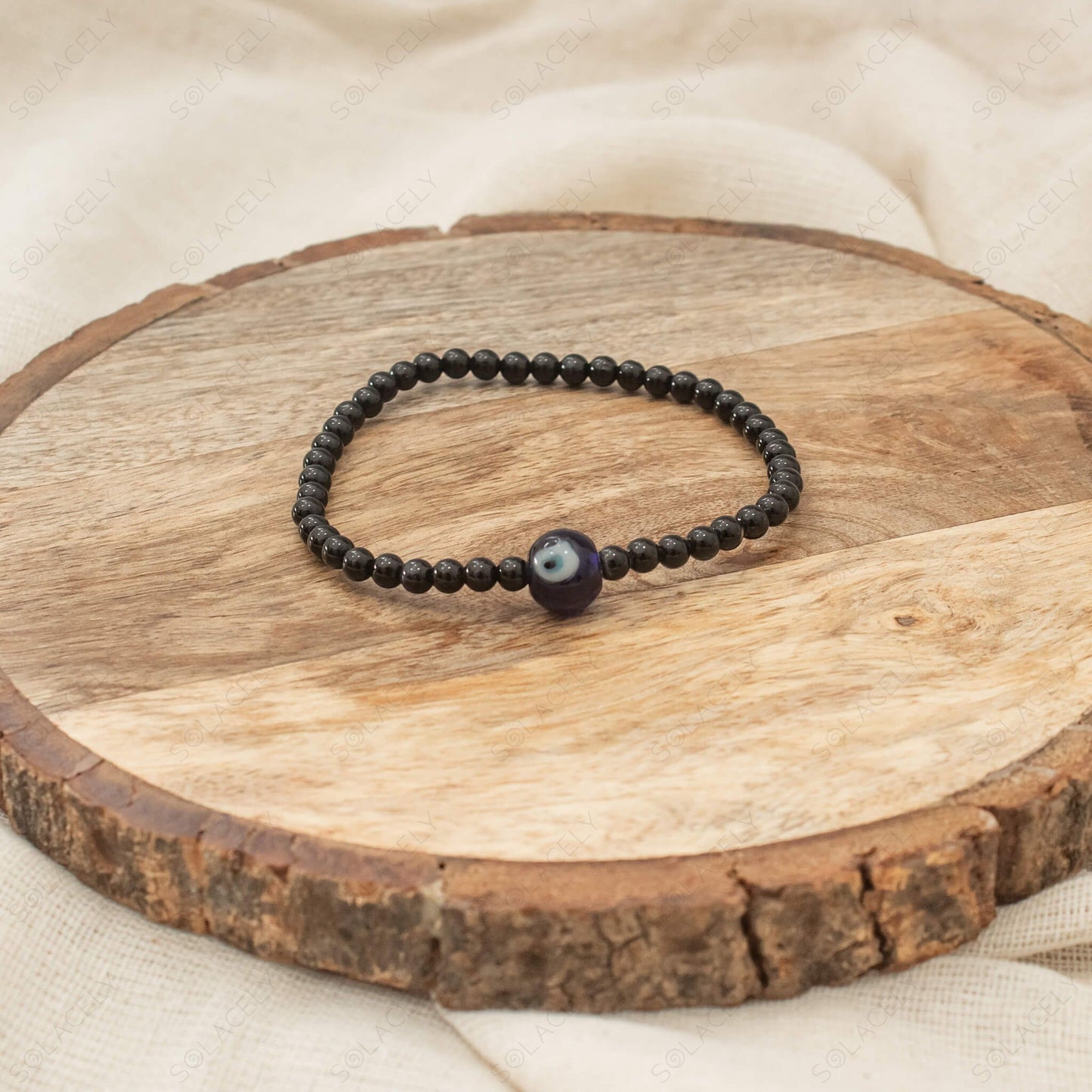 4mm black tourmaline bracelet with evil eye charm