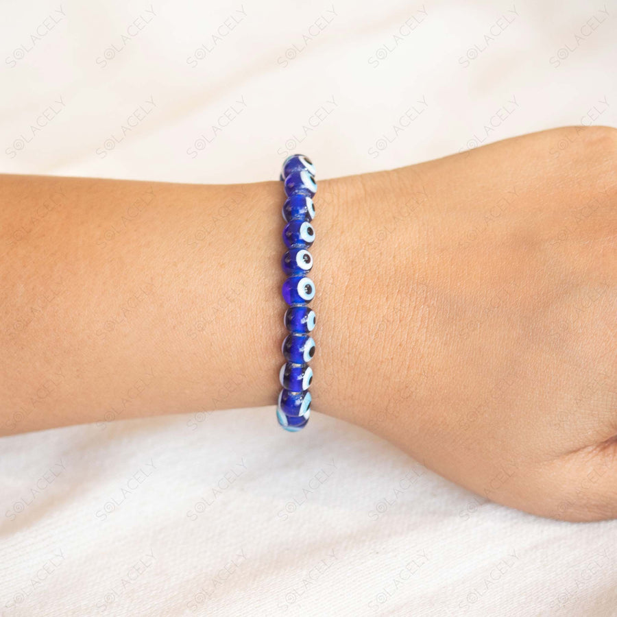 bracelet with evil eye and 6mm beads