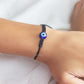 evil eye black string bracelet