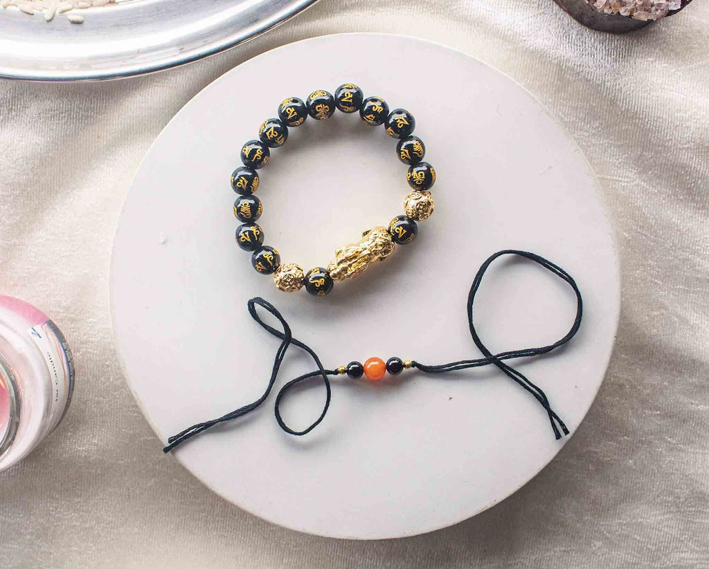 feng shui pixiu black obsidian bracelet and crystal rakhi hamper for brother