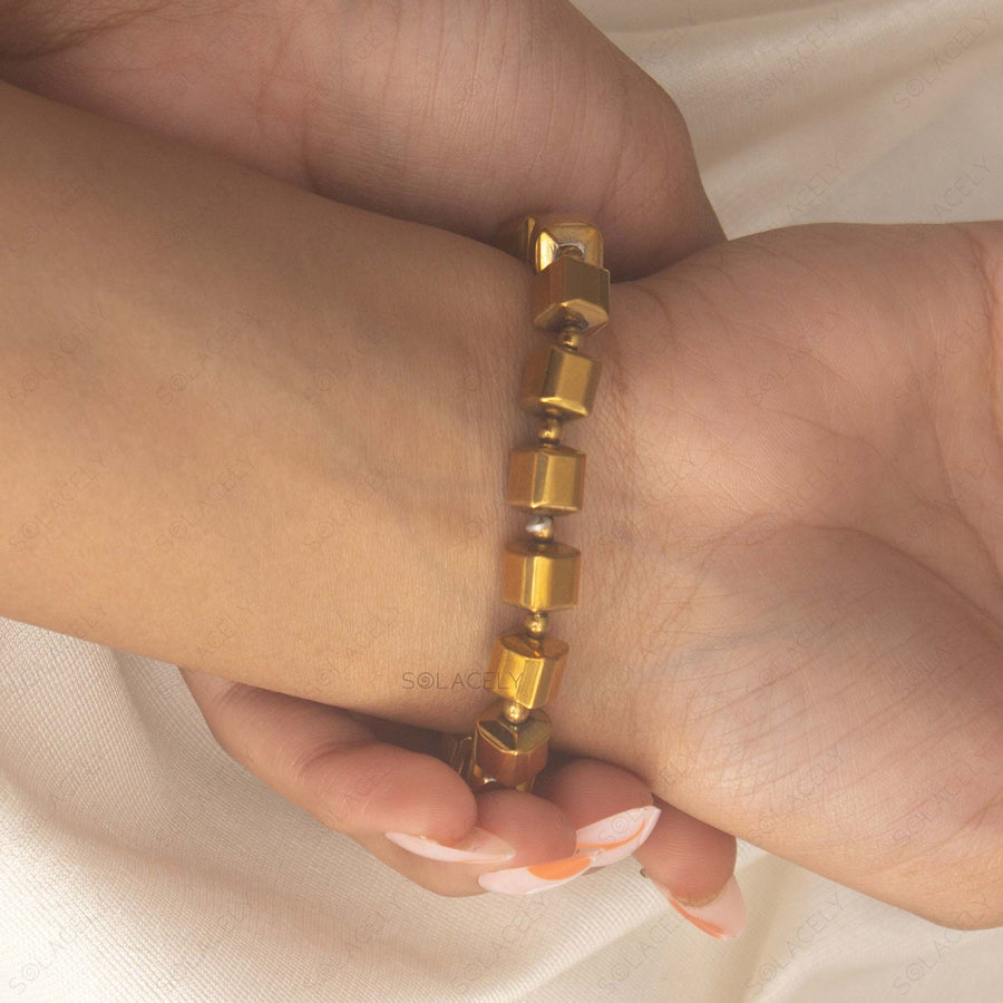 hematite bracelet with golden tone