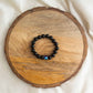 kid's bracelet featuring black tourmaline and evil eye 8mm beads