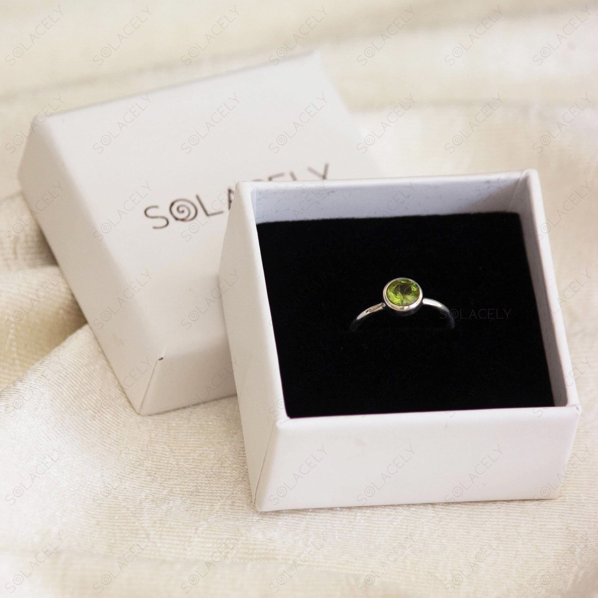 luxurious sterling silver ring featuring peridot stone