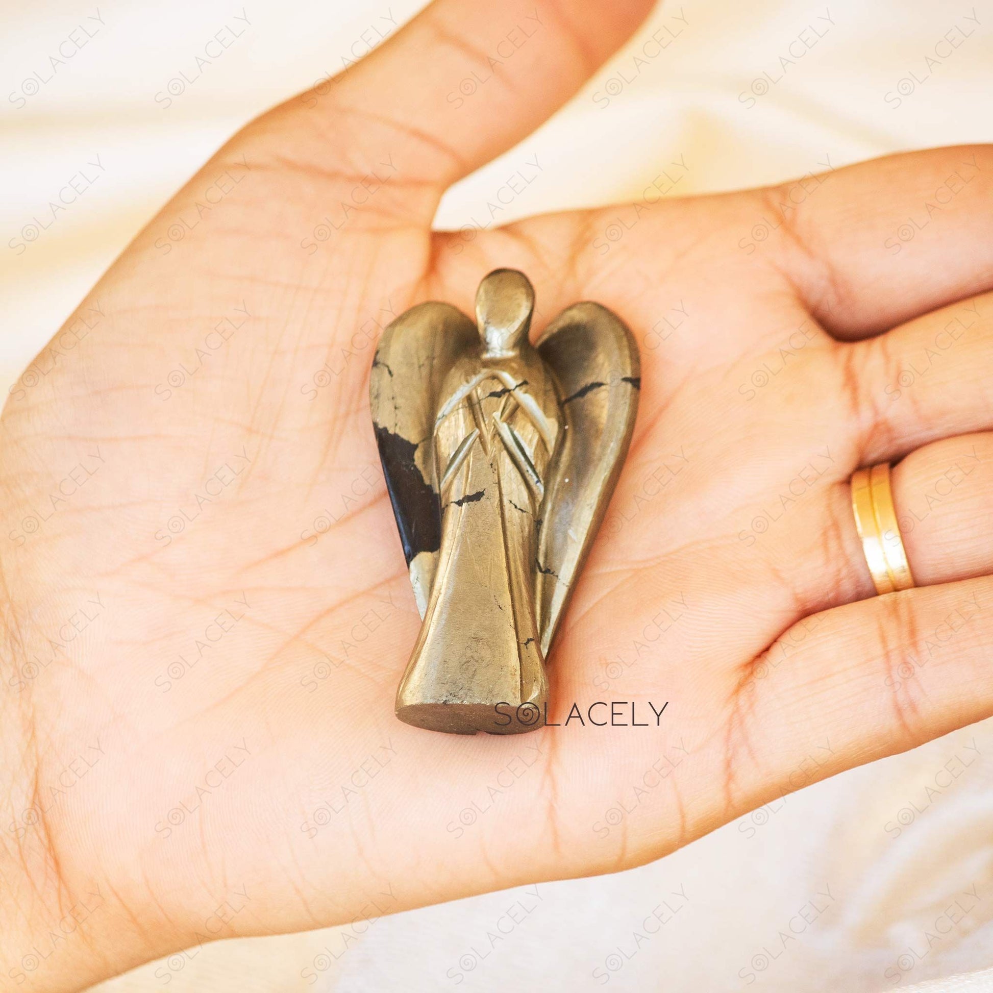 pyrite crystal angel statue