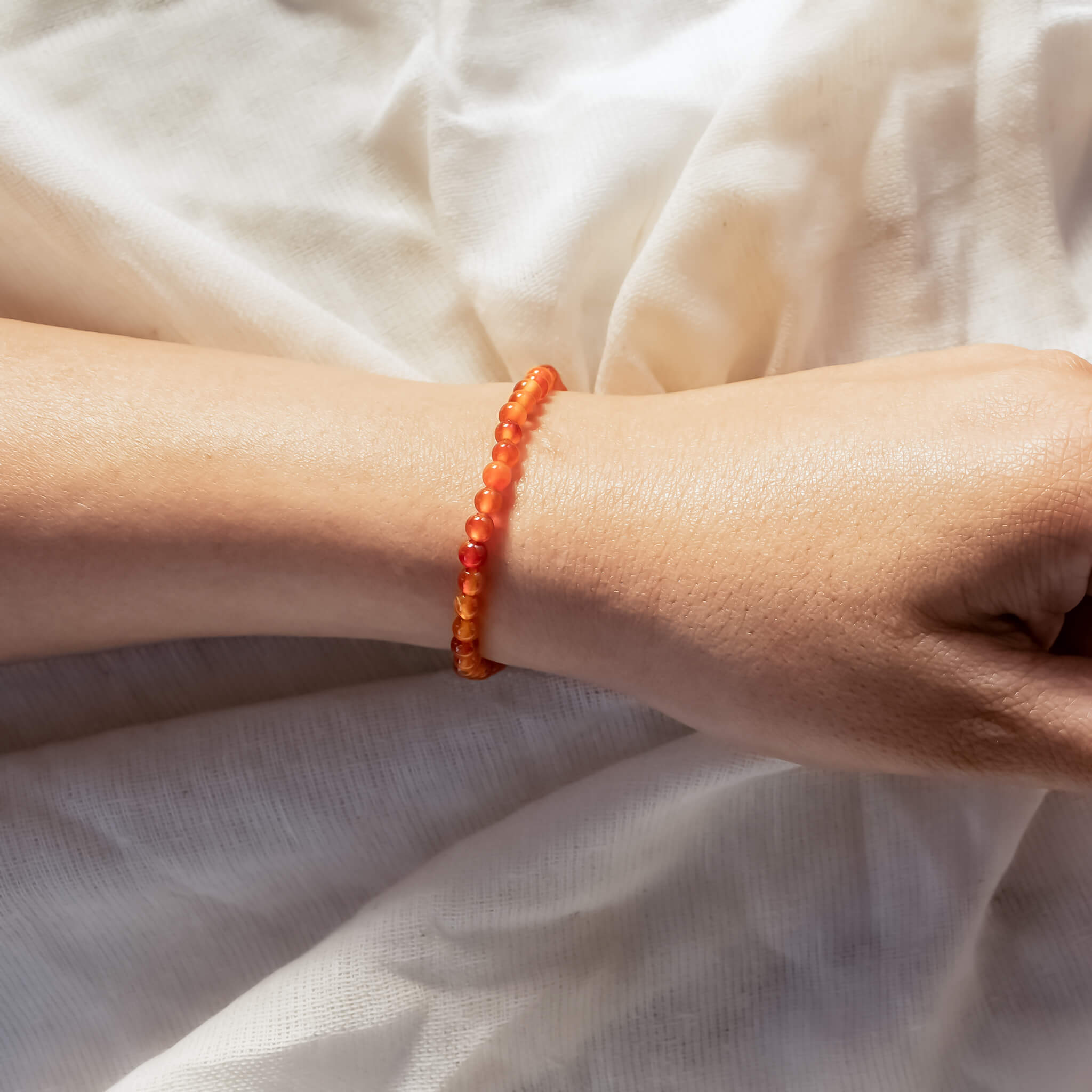 Buy Carnelian Bracelet with Om Charm Online in India - Mypoojabox.in
