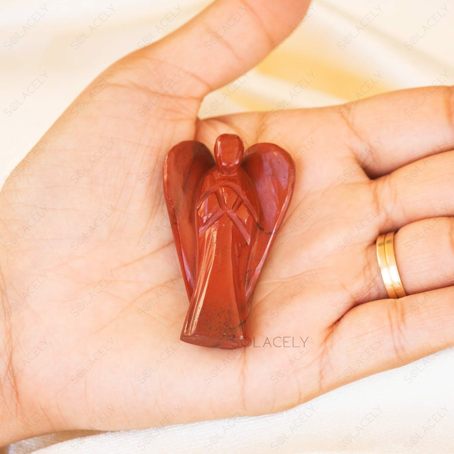 red jasper guardian angel figurine