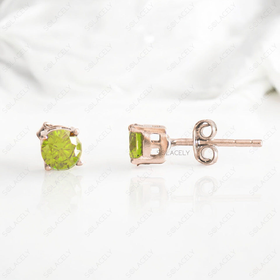 rhodium plated peridot sterling silver stud earrings