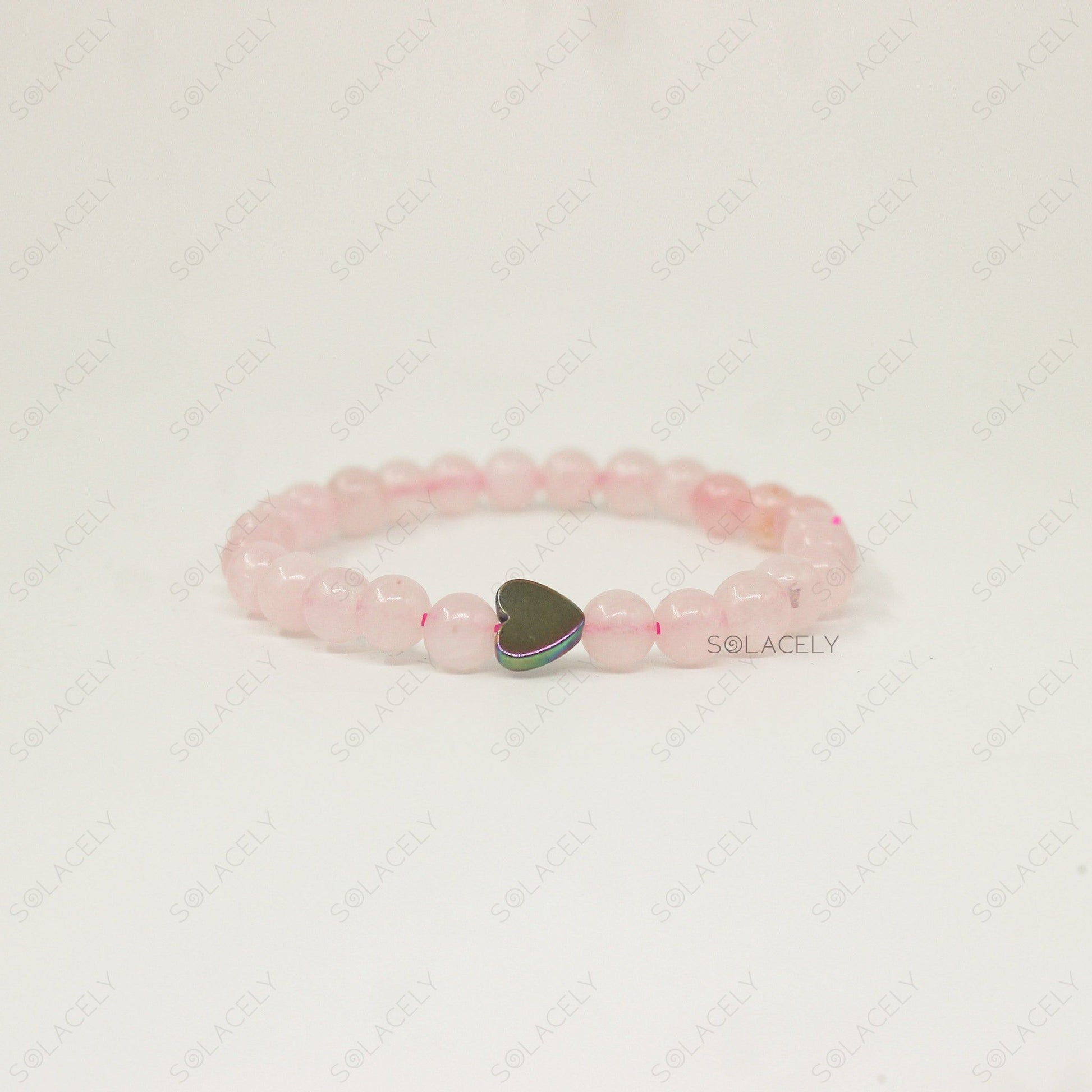 rose quartz with heart charm