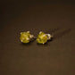 silver earrings with raw peridot