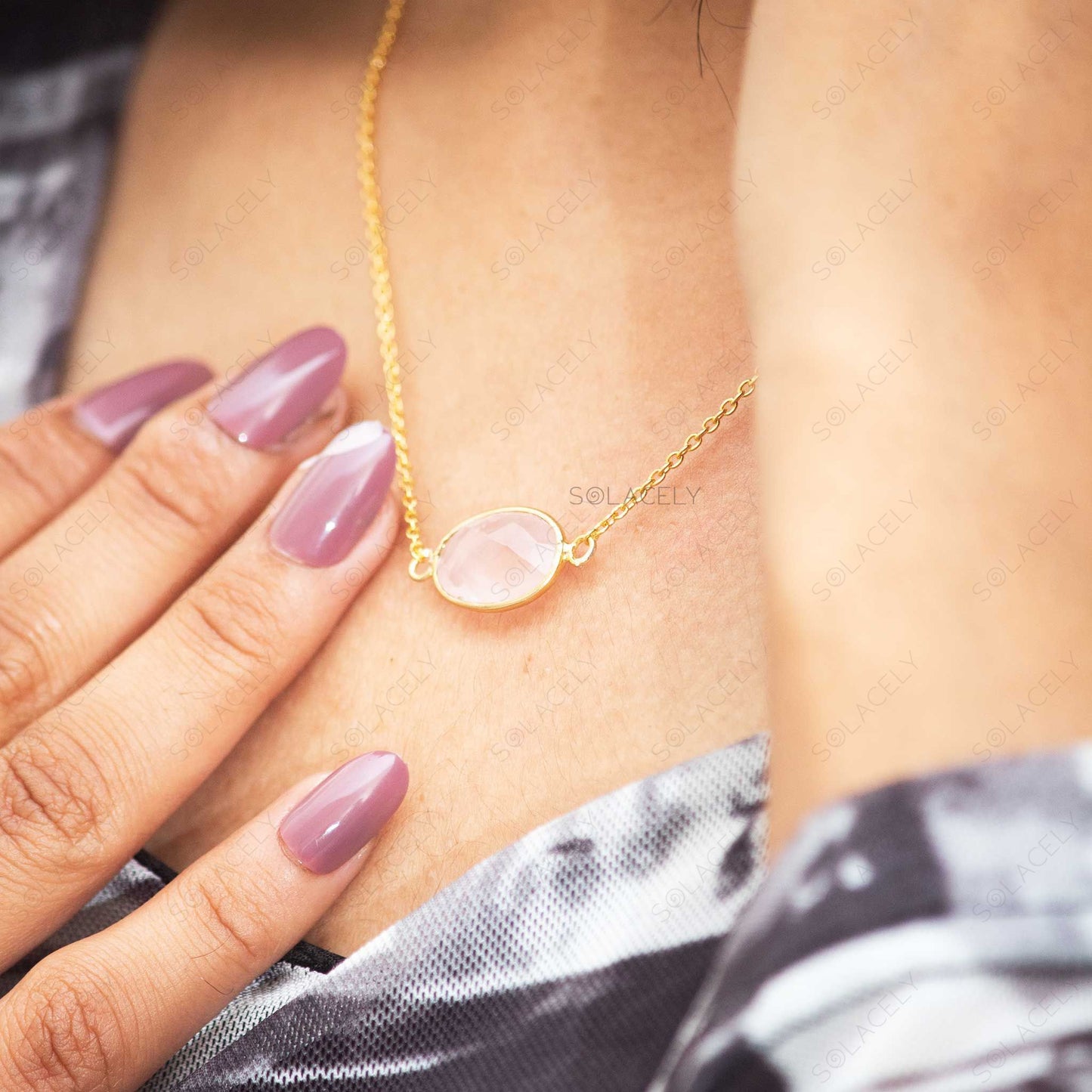 sterling silver necklace with gold rose quartz oval shape