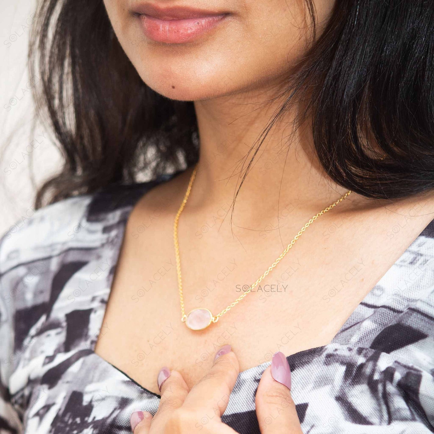 sterling silver necklace with rose quartz oval shape and gold plating