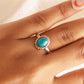 sterling silver ring with turquoise oval