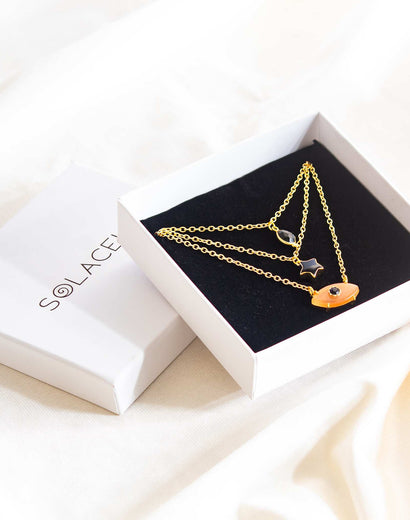 triple layer black onyx and peach necklace