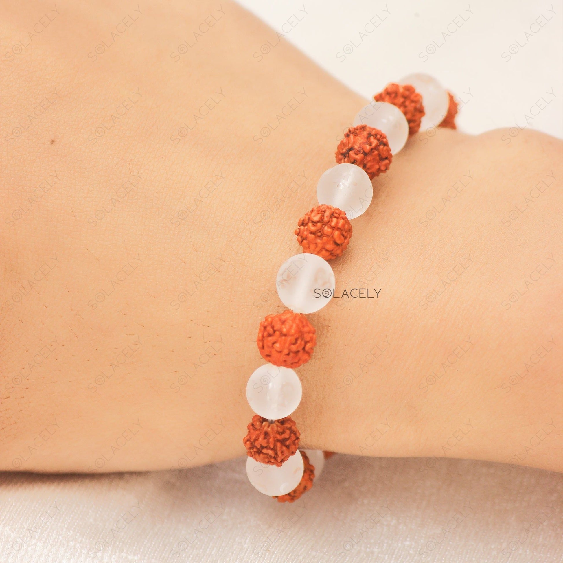 white quartz om with rudraksha