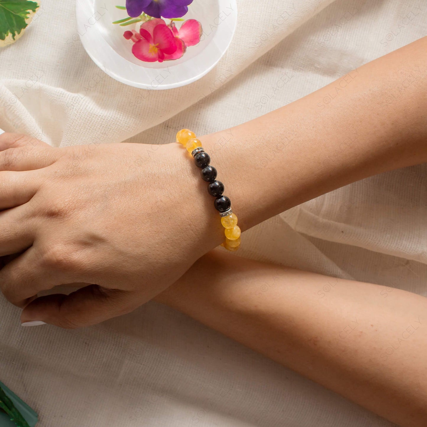 Citrine and Black tourmaline crystal bracelet in Hand