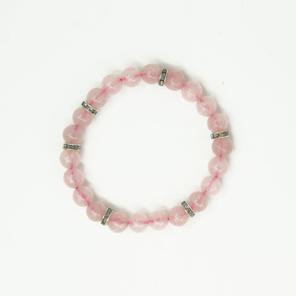 rose quartz bracelet with charms